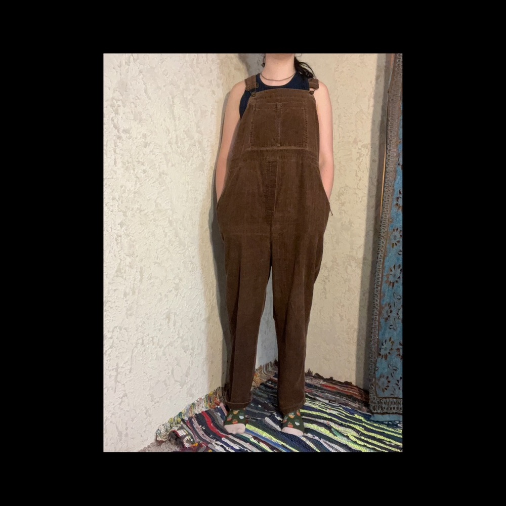 Maternity wear baggy corduroy overalls.